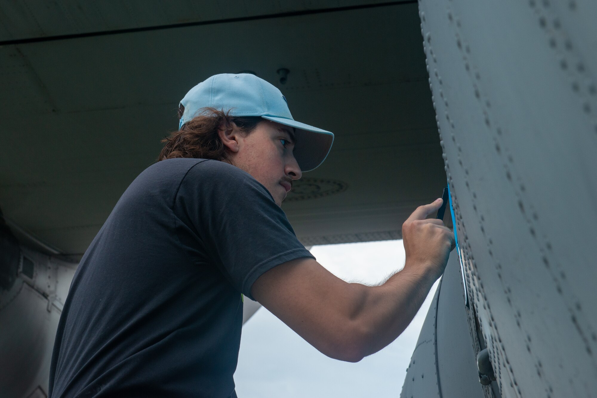 Streamline Design workers update static aircraft as part of preservation efforts
