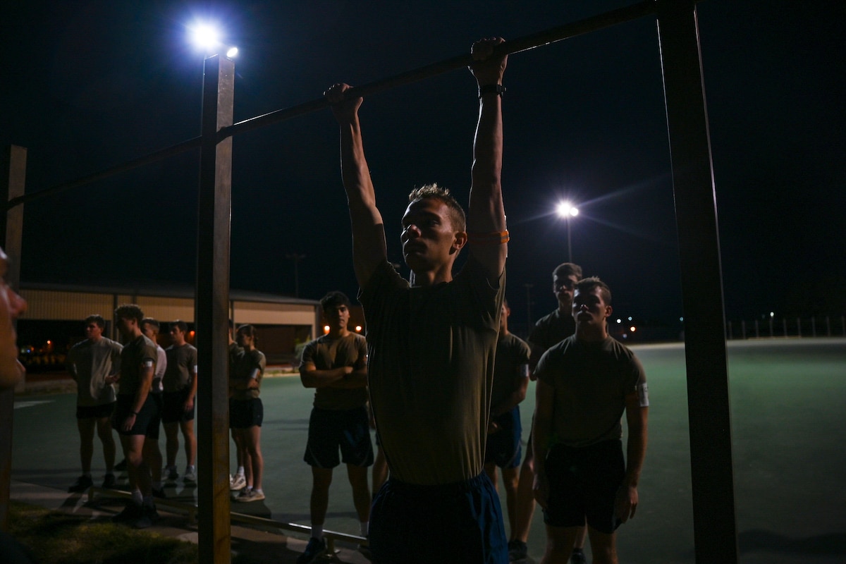 U.S. Air Force Reserve Officer Training Corps cadets from eleven universities complete pull-ups during the Special Warfare Air Force Reserve Officer Training Corps Weekend at the Mathis Gym, Goodfellow Air Force Base, Texas, Oct. 19, 2024. Cadets competed in events that tested their readiness knowledge, problem-solving skills, physical fitness, communication, memorization, land navigation, medical evacuation and mental capabilities under stressed conditions. (U.S. Air Force photo by Airman 1st Class Evelyn J. D’Errico)