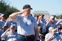 John Mroz, U.S. Army Vietnam War veteran, salutes the flag during a Joint Service Color Guard posting of the colors at the World War II Memorial in Washington, D.C., Oct. 23, 2024. Mroz served in the Vietnam War in 1967 with the 67th Engineer Company. (U.S. Air Force photo by Hayden Hallman)
