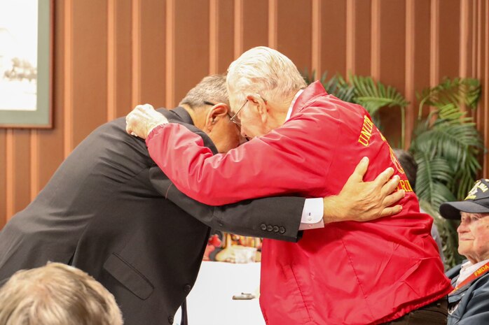 Retired Maj. Gen. Juan Ayala embraced a World War II veteran at the 74th annual 5th Marine Division reunion on October 17, 2024, in San Antonio, Texas. Veterans of 5th MARDIV gather every year to share stories and continue conversation of their legacy. 5th MARDIV has activated twice in history; first for service in WWII and last for reinforcement of the Vietnam War. (U.S. Marine Corps photo by Cpl. Jonathan Baez)