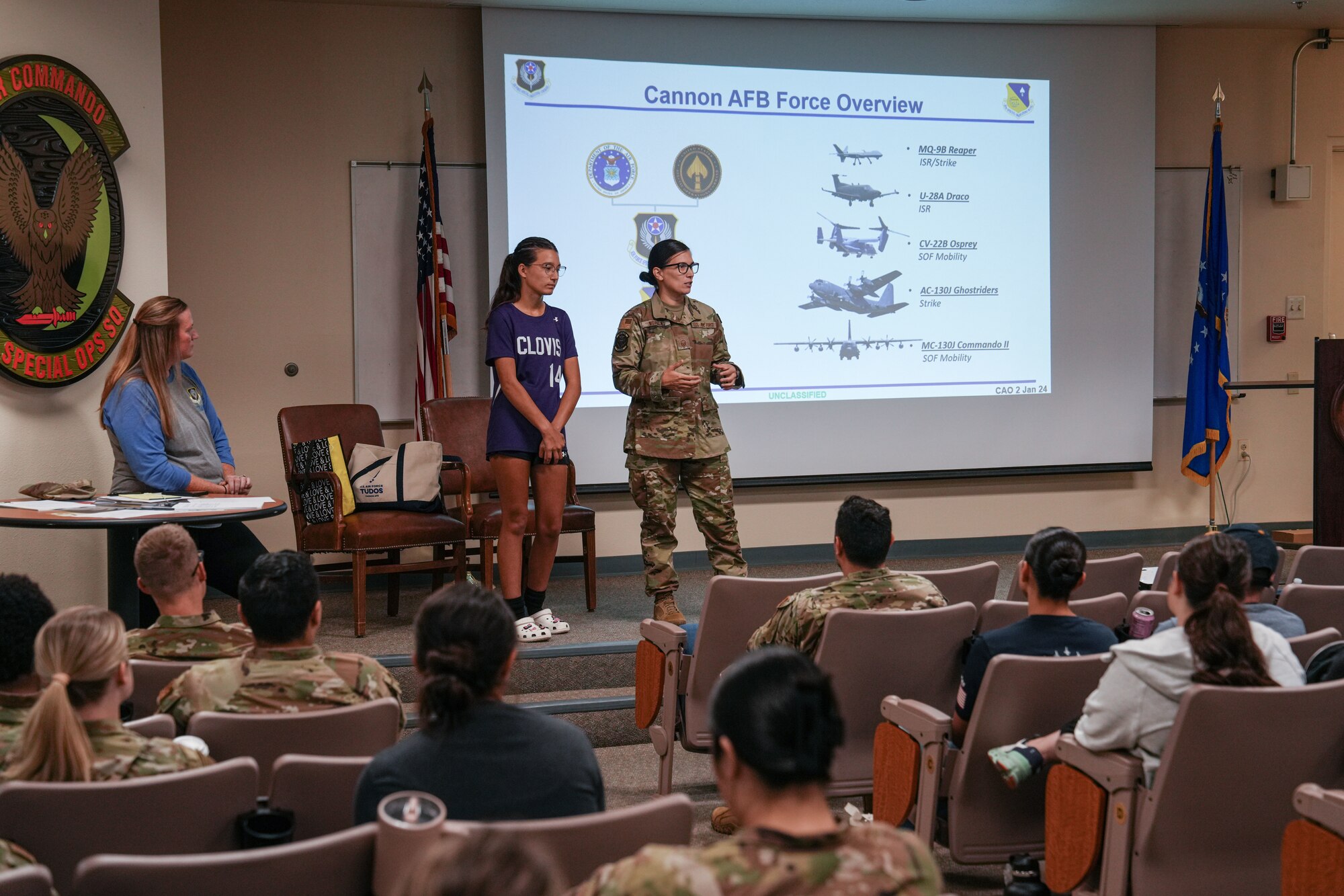 Senior Master Sergeant Samantha Worden, the 16th Special Operations Aircraft Maintenance Squadron Support Flight Chief, briefs local educators on the aircraft and mission of the 27th Special Operations Wing during Teachers Understanding Deployment Operations Day at Cannon Air Force Base, New Mexico, Sept. 28, 2024. Promoting public understanding of the Air Force Special Operations Command mission to the general public is essential to connecting military members with the local community. (U.S. Air Force photo by Airman 1st Class Gracelyn Hess)