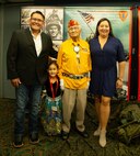Navajo Code Talker Thomas Begay poses with his family during the 74th annual 5th Marine Division reunion on October 19, 2024 in San Antonio, Texas. Mr. Begay is one of two remaining original Navajo Code Talkers that served during World War II. He was joined by many other WWII and Vietnam veterans at their annual reunion honoring all Marines who served under 5th MARDIV. (U.S. Marine Corps photo by Staff Sgt. Ryanne Williams)
