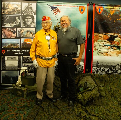 Navajo Code Talker Thomas Begay poses with his son Ronald Begay during the 74th annual 5th Marine Division reunion on October 19, 2024 in San Antonio, Texas. Mr. Begay is one of two remaining original Navajo Code Talkers that served during World War II. He was joined by many other WWII and Vietnam veterans at their annual reunion honoring all Marines who served under 5th MARDIV. (U.S. Marine Corps Photo by Staff Sgt. Ryanne Williams)