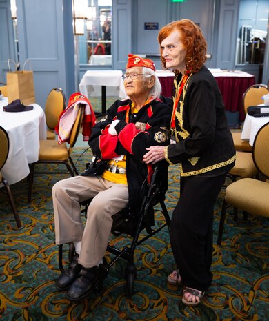 Navajo Code Talker Thomas Begay poses for photos with a fellow participant during the 74th annual 5th Marine Division reunion on October 19, 2024 in San Antonio, Texas. Mr. Begay is one of two remaining original Navajo Code Talkers that served during World War II. He was joined by many other WWII and Vietnam veterans at their annual reunion honoring all Marines who served under 5th MARDIV. (U.S. Marine Corps Photo by Staff Sgt. Ryanne Williams)