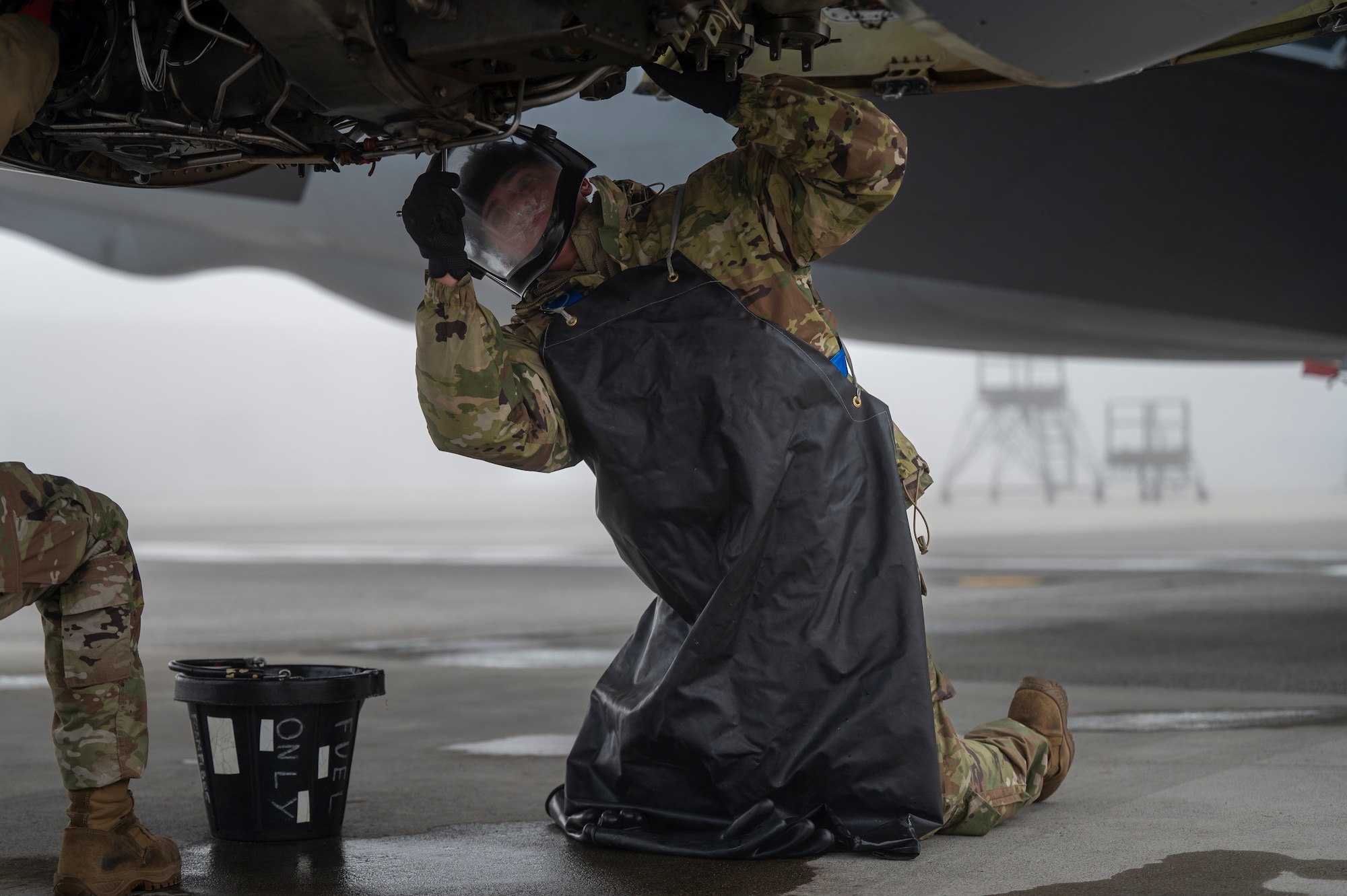 U.S. Air Force Airman Miguel Guerrero, an aerospace propulsion specialist assigned to the 92nd Maintenance Squadron, removes fuel filters during exercise Mobility Response 25 in support of U.S. Strategic Command exercise Global Thunder 25 at Fairchild Air Force Base, Washington, Oct. 23, 2024. Guerrero performed routine maintenance during exercise MR25 to ensure aircraft are fully operational, safe, and ready for critical missions. The KC-135 Stratotanker played a crucial role in this exercise and GT25, providing essential air-to-air refueling capabilities that are vital for sustaining long-range operations. (U.S. Air Force photo by Airman 1st Class Stassney Davis)