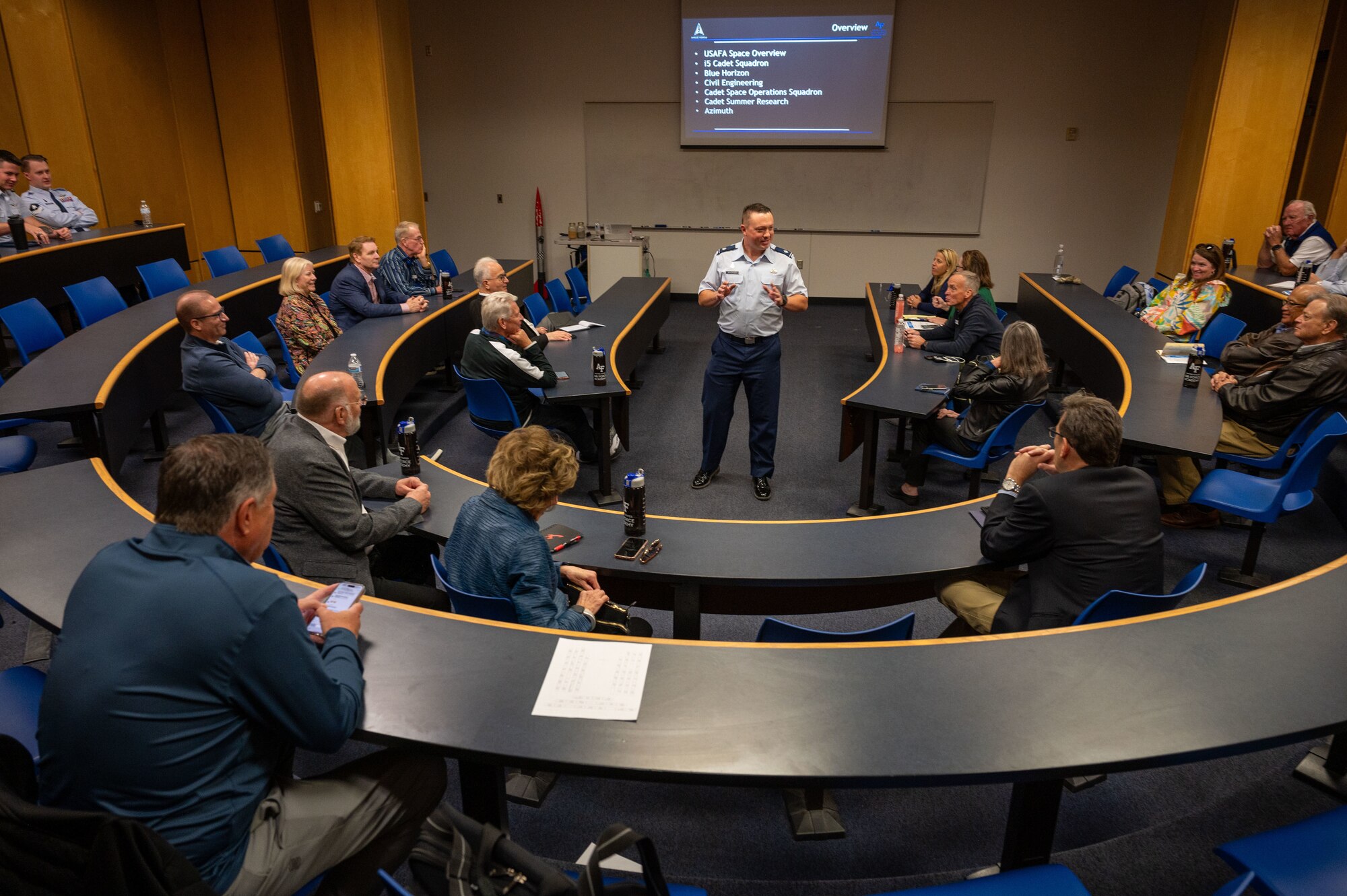 U.S. Space Force Lieutenant Colonel Adam Wasinger, Space Force Delta 13 Detachment 1 director of operations, briefs 21 Department of the Air Force Civic Leaders about the U.S. Air Force Academy's space-education programs during a tour on October 23rd 2024.