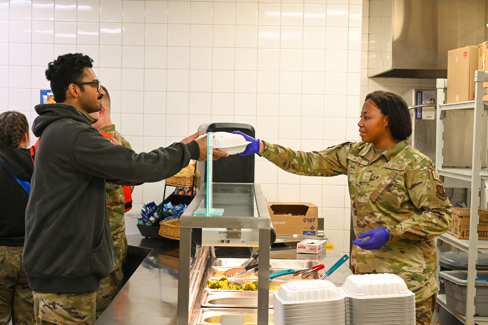 Airman 1st Class Cassandra Magee, 5th Force Support Squadron food service specialist, prepares meals in the alert facility during Global Thunder 25 (GT25) at Minot Air Force Base, North Dakota, Oct. 20, 2024. GT25 provides training opportunities for components, units and task forces to deter and, if necessary, defeat a military attack against the United States and to employ forces as directed by the president. (U.S. Air Force photo by Airman 1st Class Trust Tate)
