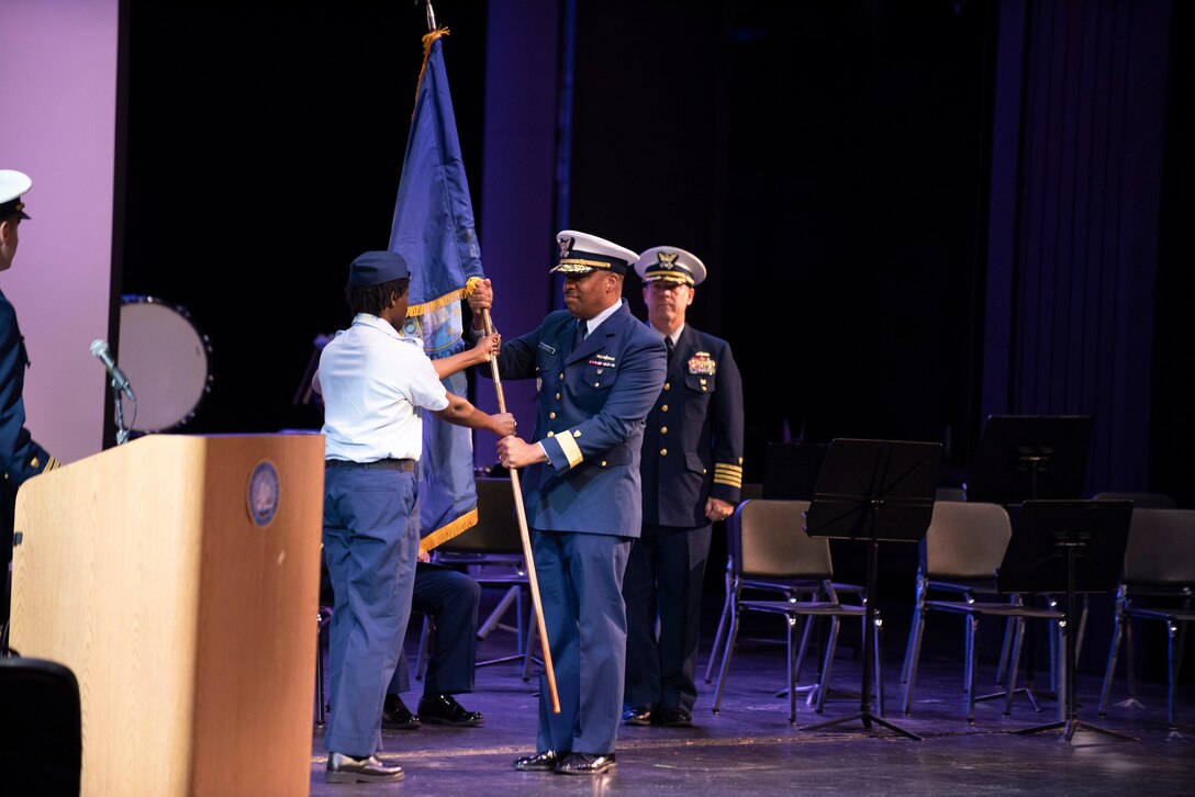 Cadets stand in formation during the commissioning ceremony of the Coast Guard JROTC unit at Barnstable High School. The program aims to instill values of citizenship, personal responsibility, and service in students. (U.S. Coast Guard photo by Chief Petty Officer Richard Brahm)