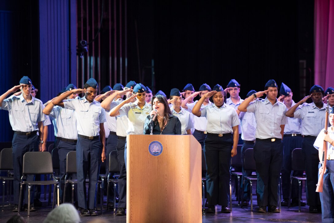 Cadets stand in formation during the commissioning ceremony of the Coast Guard JROTC unit at Barnstable High School. The program aims to instill values of citizenship, personal responsibility, and service in students. (U.S. Coast Guard photo by Chief Petty Officer Richard Brahm)