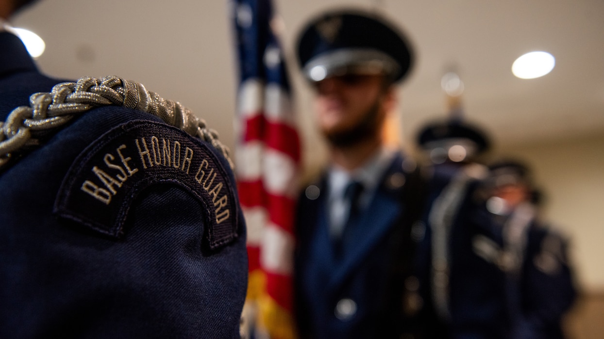 Honor guard standing by to present the colors