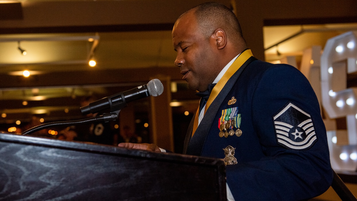 Airman delivers the invocation