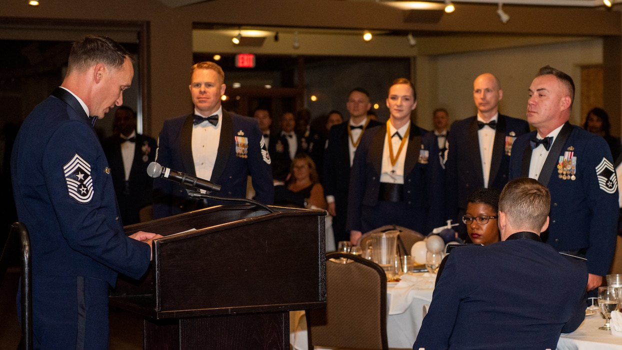 621st CRW command chief deliver senior noncommissioned officer charge at podium