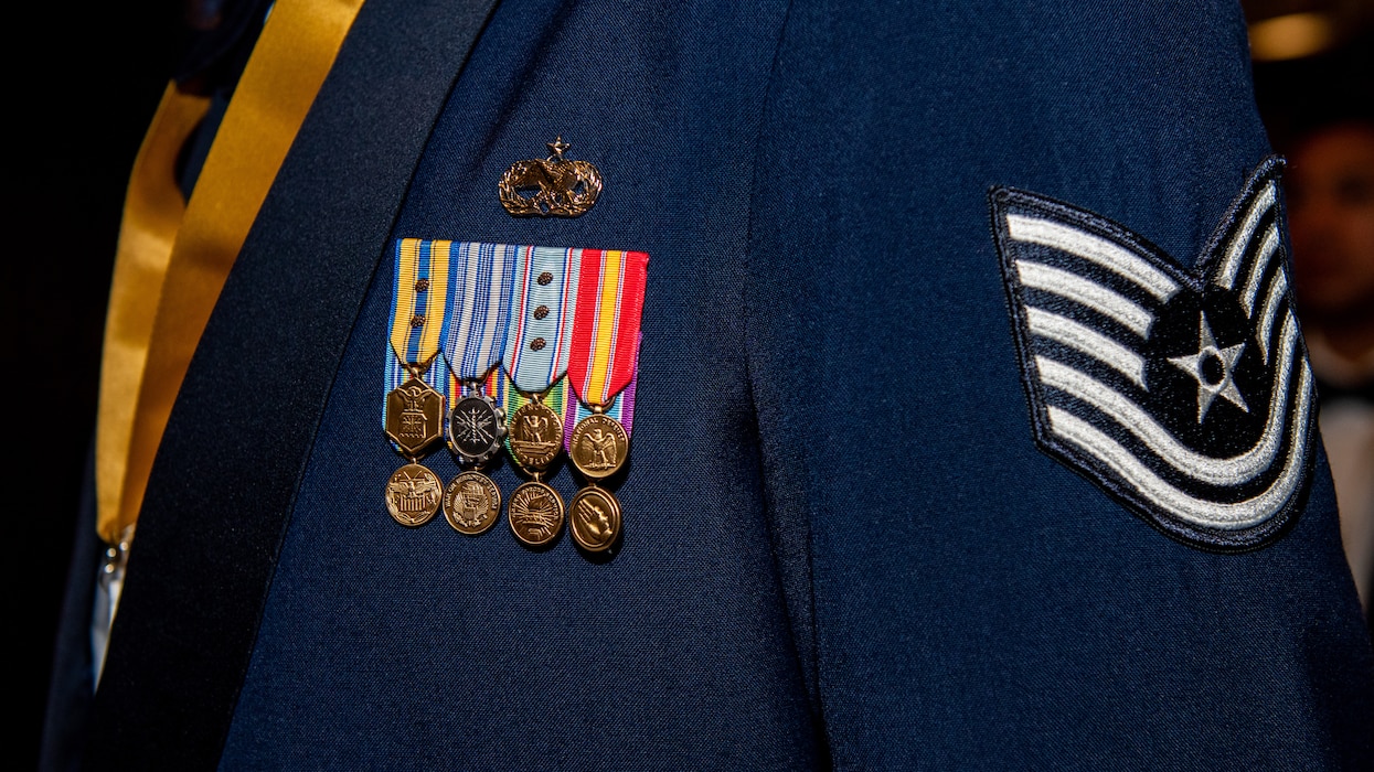 Close up of medals on mess dress uniform