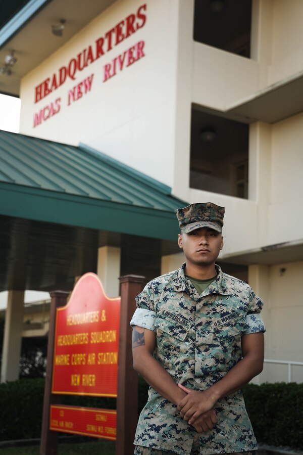 U.S. Marine Corps Lance Cpl. Andi LopezRojas, an aviation operations specialist with Headquarters and Headquarters Squadron, Marine Corps Air Station (MCAS) New River, poses for a photo outside of his office on MCAS New River in Jacksonville, North Carolina, Oct. 22, 2024. LopezRojas, the recipient of the October 2024 MCAS New River Go-Getter award, is a New Jersey native and enlisted in the Marine Corps in 2022. (U.S. Marine Corps photo by Cpl. Zeta Johnson)
