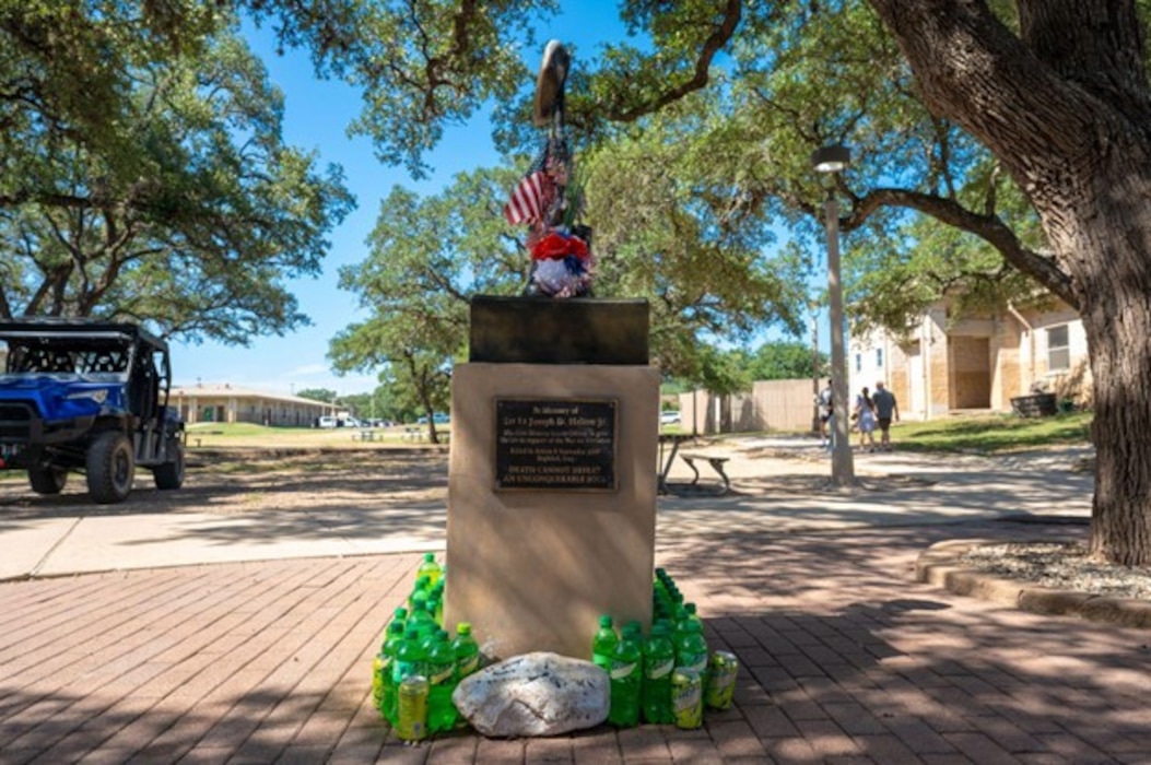 Memorial standing outside of Defender Inn Dining Facility in honor of 1st Lt Joseph Helton Jr