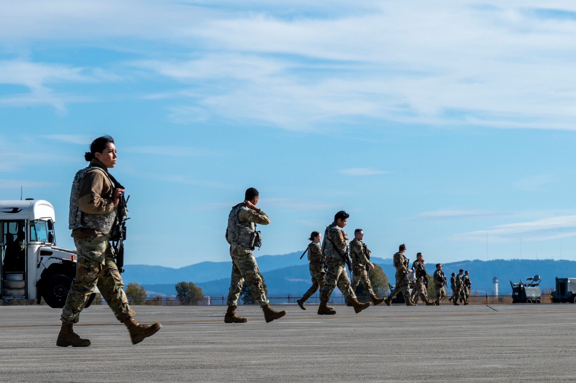 U.S. Air Force Airmen assigned to the 92nd Security Forces Squadron purge the flightline searching for explosive devices or anything out of the ordinary during exercise Mobility Response 25 in support of U.S. Strategic Command exercise Global Thunder 25 at Fairchild Air Force Base, Washington, Oct. 20, 2024. A purge consists of a team of security forces Airmen sweeping the flightline for any hazardous material and securing the area. U.S. Strategic Command forces, their components and subordinate units are on watch 24 hours a day, 365 days a year, conducting operations to deter and detect strategic attack against the United States and our allies. (U.S. Air Force photo by Airman 1st Class Samantha Thorn)