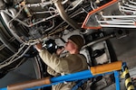 U.S. Airman 1st Class Hector Huerta, 736th Aircraft Maintenance Squadron aerospace propulsion journeyman, performs an inspection on a C-17 Globemaster III engine at Dover Air Force Base, Delaware, Oct. 15, 2024. Huerta and other maintainers performed the task as part of a C-17 Home Station Check which is accomplished every 180 days. (U.S. Air Force photo by Roland Balik)