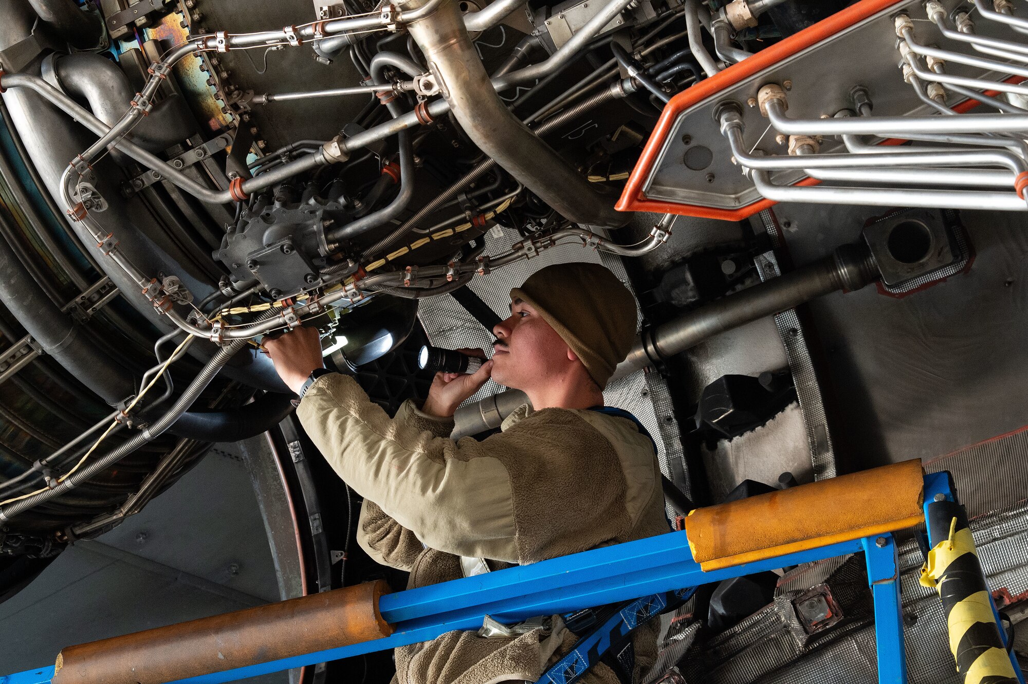 U.S. Airman 1st Class Hector Huerta, 736th Aircraft Maintenance Squadron aerospace propulsion journeyman, performs an inspection on a C-17 Globemaster III engine at Dover Air Force Base, Delaware, Oct. 15, 2024. Huerta and other maintainers performed the task as part of a C-17 Home Station Check which is accomplished every 180 days. (U.S. Air Force photo by Roland Balik)