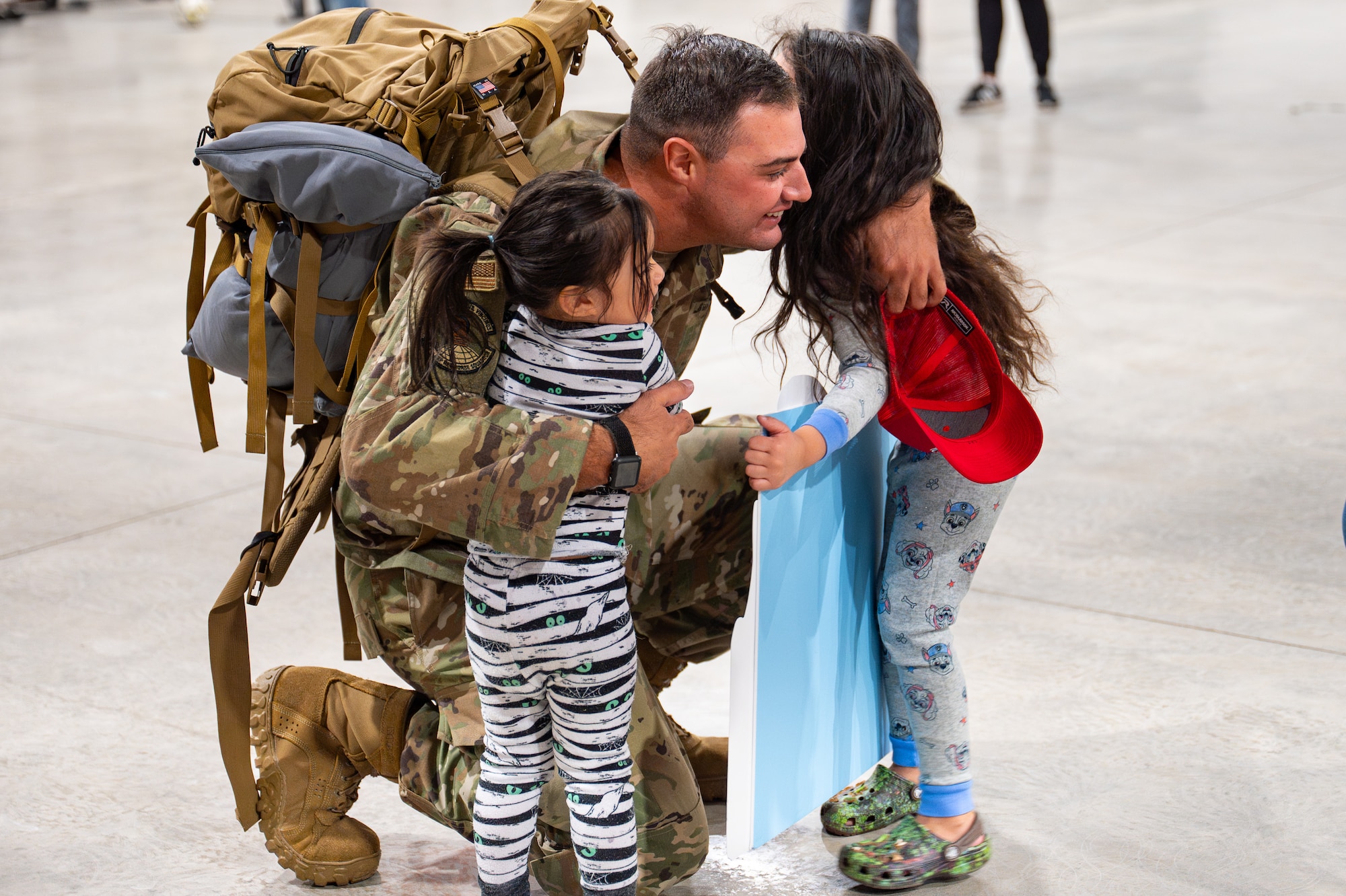 Uniformed personnel stand together in a photo.