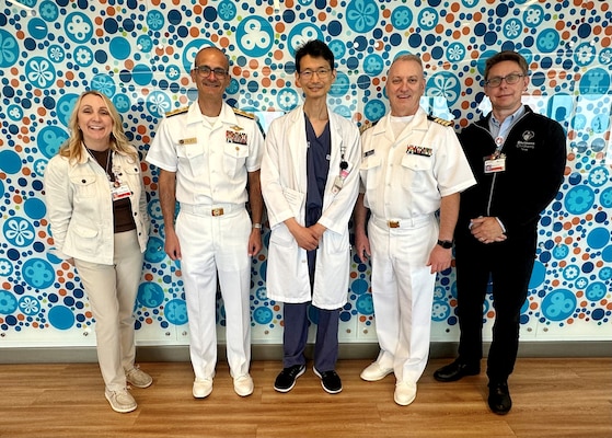 Capt. Matthew Loe (second from right), executive officer of NMRTC Lemoore and a Galveston native, joins Rear Adm. Guido Valdes (second from left), commander of Naval Medical Forces Pacific and chief of the Navy Medica Corps, and the Navy Medicine team at Shriners Children’s Texas in Galveston, Texas, on Oct. 22 for an opportunity to explore the hospital’s capabilities and meet with the hospital’s staff, led by Chief of Staff Dr. Jong Lee (center). The visit highlighted the hospital’s comprehensive care for children, including prosthetic services, music therapy, and specialized education programs. Hundreds of Sailors are participating in more than 75 events throughout Galveston during the Navy Week from Oct. 21 – 27, 2004. (U.S. Navy photo by Arsenio R. Cortez Jr.)