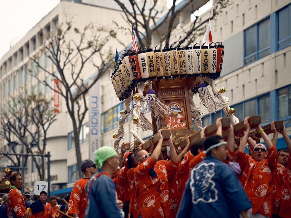 Volunteers from the base community participated in the 45th Annual Yokosuka Mikoshi Parade Sunday, October 27 in downtown Yokosuka. Commander, Fleet Activities Yokosuka (CFAY) Morale, Welfare, and Recreation (MWR) coordinated the base volunteer effort to carry the installation's custom mikoshi through Yokosuka's Chuo-odori, or Blue Street.