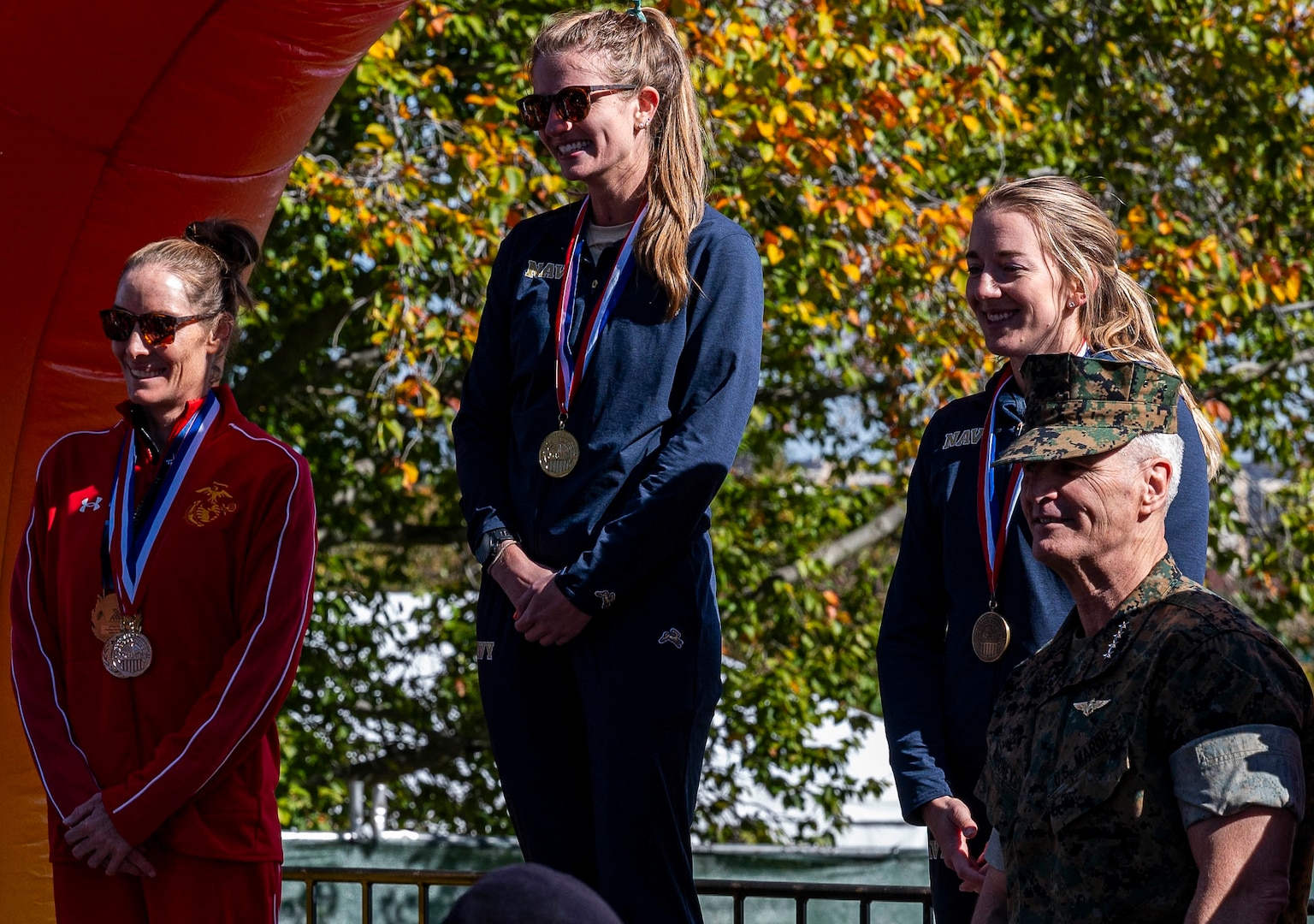 Gold medalist Navy LT Megan Walsh, NB San Diego, CA; Silver medalist Marine Maj Mollie Geyer, MCAS Miramar, CA; 
Bronze medalist Navy LT Madison Overby, NS Norfolk, VA. The 2024 Armed Forces Marathon Championships held in conjunction with the 49th Marine Corps Marathon on Sunday, October 27th. Service members from the Army, Marine Corps, Navy (with Coast Guard runners, and Air Force (with Space Force runners) go for gold.  Visit www.ArmedForcesSports.defense.gov to learn more about the Armed Forces Sports program and the other sports offered. (Department of Defense photo by MC2 Colby A. Mothershead – released).