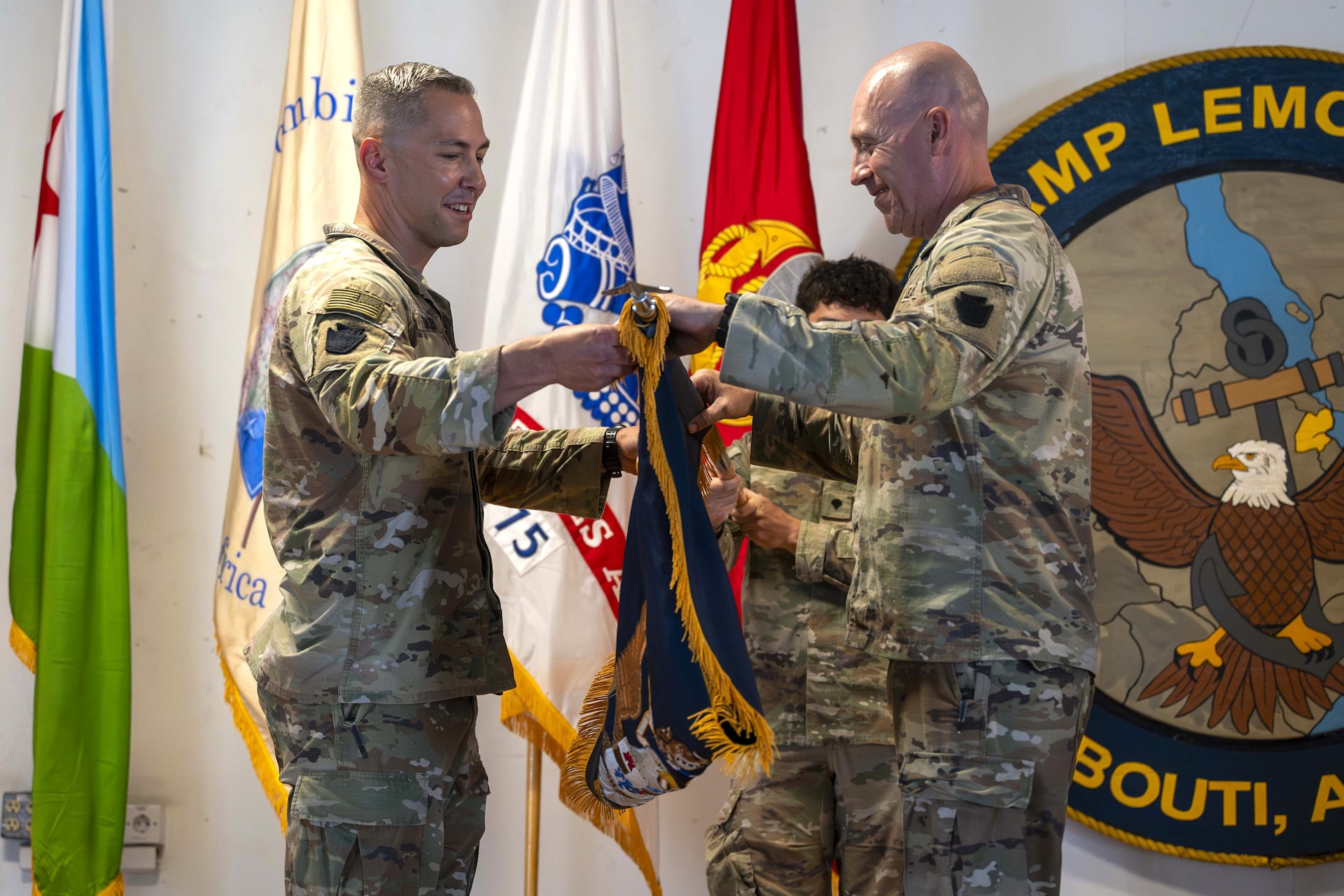 The Pennsylvania National Guard’s Task Force Associator assumed control over the security mission in East Africa from Task Force Paxton, another Pennsylvania National Guard Unit, during a transfer of authority ceremony at Camp Lemonnier, Djibouti Oct. 21, 2024. The ceremony is a military tradition representing a formal transfer of authority and responsibility for a mission from one unit to the next. (U.S. Army National Guard photo by SGT. Lark Sine)