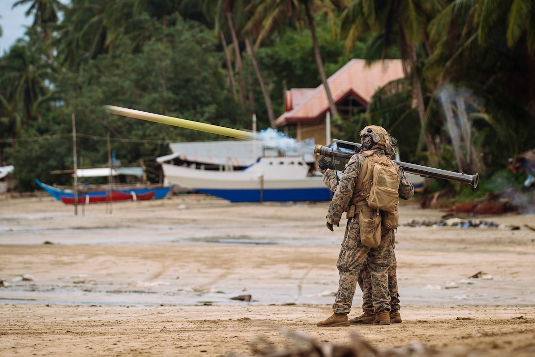 Low altitude air defense Marines assigned to Marine Medium Tiltrotor Squadron (VMM) 165 (Reinforced), 15th Marine Expeditionary Unit, fire an FIM-92 Stinger during a live-fire coastal defense as part of exercise KAMANDAG 8 at Apurawan Beach, Palawan Province, Philippines, Oct. 22, 2024. KAMANDAG is an annual Philippine Marine Corps and U.S. Marine Corps-led exercise aimed at enhancing the Armed Forces of the Philippines’ defense and humanitarian capabilities by providing valuable training in combined operations with foreign militaries in the advancement of a Free and Open Indo-Pacific. This year marks the eighth iteration of this exercise and includes participants from the French Armed Forces, Royal Thai Marine Corps, and Indonesian Marine Corps; including continued participation from the Australian Defense Force, British Armed Forces, Japan Ground Self-Defense Force, and Republic of Korea Marine Corps.  (U.S. Marine Corps photo by Sgt. Amelia Kang)