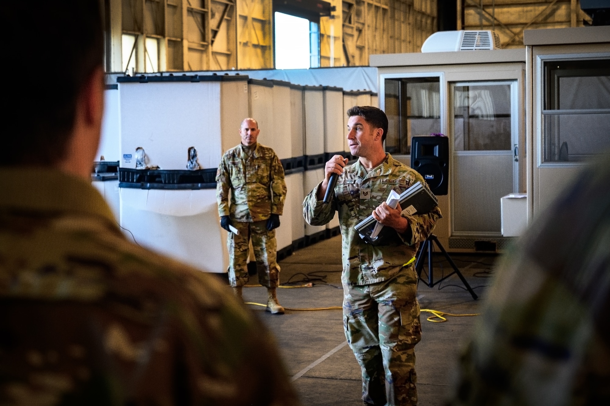 U.S. Air Force Tech. Sgt. Daniel Rose, 305th Aerial Port Squadron air transportation specialist, gives opening remarks during the APS Rodeo at Joint Base McGuire-Dix-Lakehurst, N.J., Oct. 17, 2024. The APS Rodeo is an annual event held to showcase top performers in an array of transportation challenges that simulate what it is like to work in a high-tempo environment. (U.S. Air Force photo by Senior Airman Matt Porter)