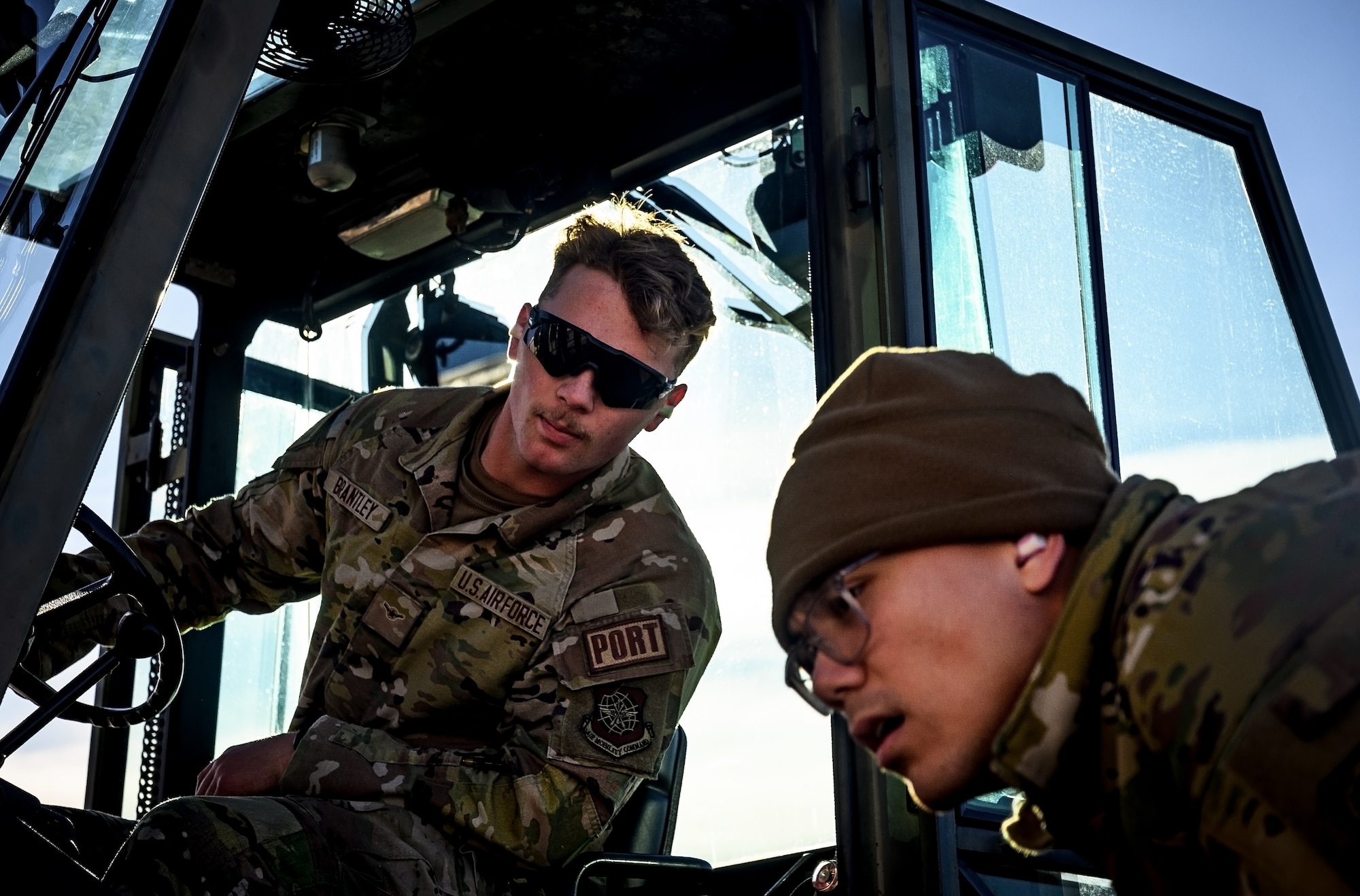U.S. Air Force Airman Cole Brantley, 305th Aerial Port Squadron transportation specialist, and U.S. Air Force Senior Airman Zir Reamico, 305th APS transportation specialist, inspect a pallet during the APS Rodeo at Joint Base McGuire-Dix-Lakehurst, N.J., Oct. 17, 2024. The APS Rodeo is an annual event held to showcase top performers in an array of transportation challenges that simulate what it is like to work in a high-tempo environment. (U.S. Air Force photo by Senior Airman Matt Porter)