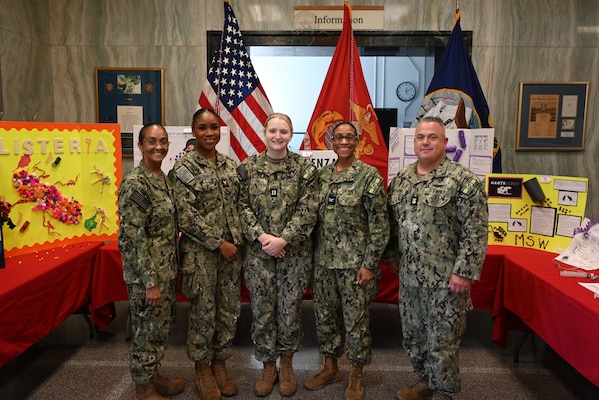 Beaufort S.C.- Lieutenant Erika Berg and Hospital Corpsman 2nd Class Satana Parchment (pictured in the middle of photo) hosted an Infection Prevention Week from 15- 18 October.