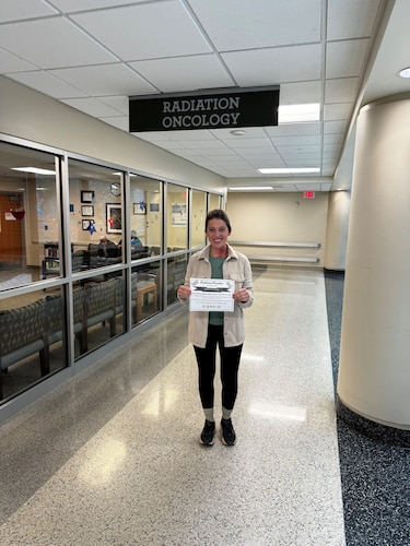Lt. Col. Jennifer Sayers completes 16 rounds of chemotherapy radiation at the Murtha Cancer Center during her battle with breast cancer. She attributes her husband, her Air Force family and her medical team as key to her surviving. (Courtesy Photo)