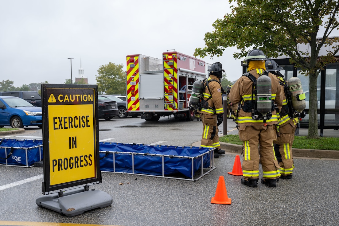 Firemen stand with setup