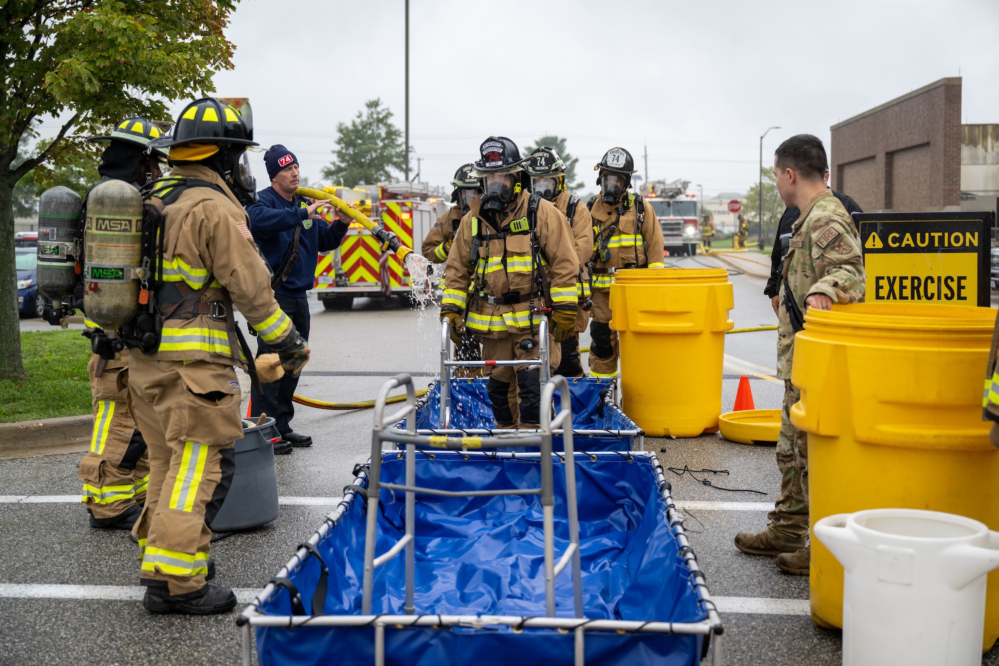 Firemen walk through setup