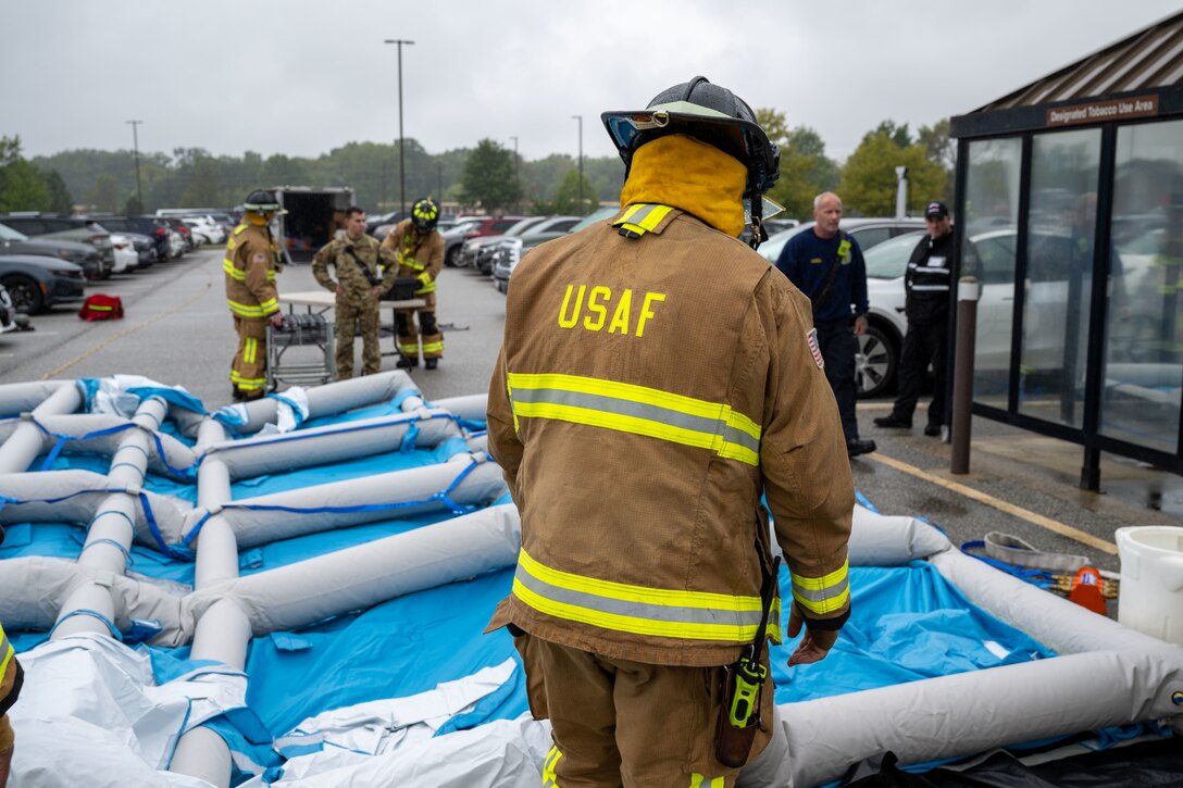 Firemen set up inflatable