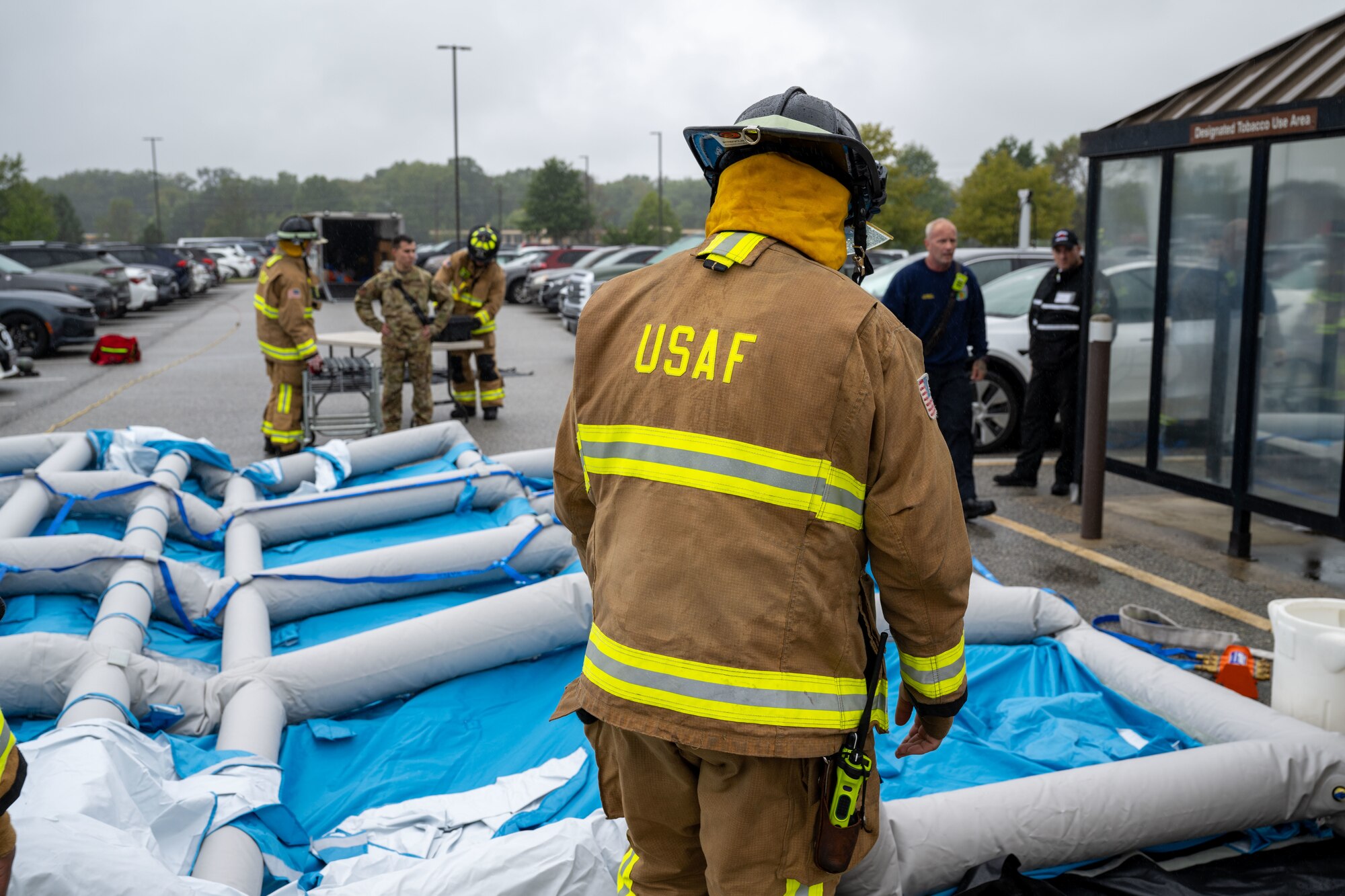 Firemen set up inflatable