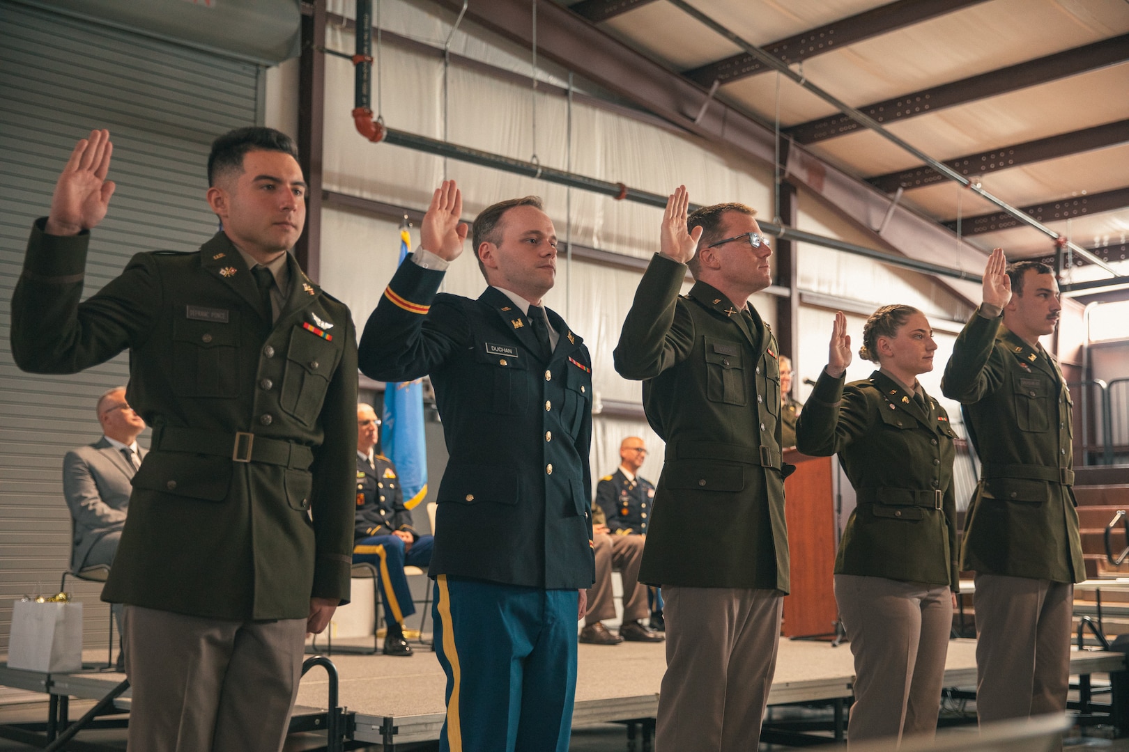 The Oklahoma Army National Guard celebrated the graduation of Officer Candidate School class 69 and 70 at Camp Gruber Training Center in Braggs, OK on Oct. 20, 2024. The ceremony honored 13 Soldiers who successfully completed all the requirements of the OCS program, making them newly commissioned 2nd Lieutenants in the Oklahoma National Guard. (Oklahoma National Guard photo by Spc. Cambrie Cannon)