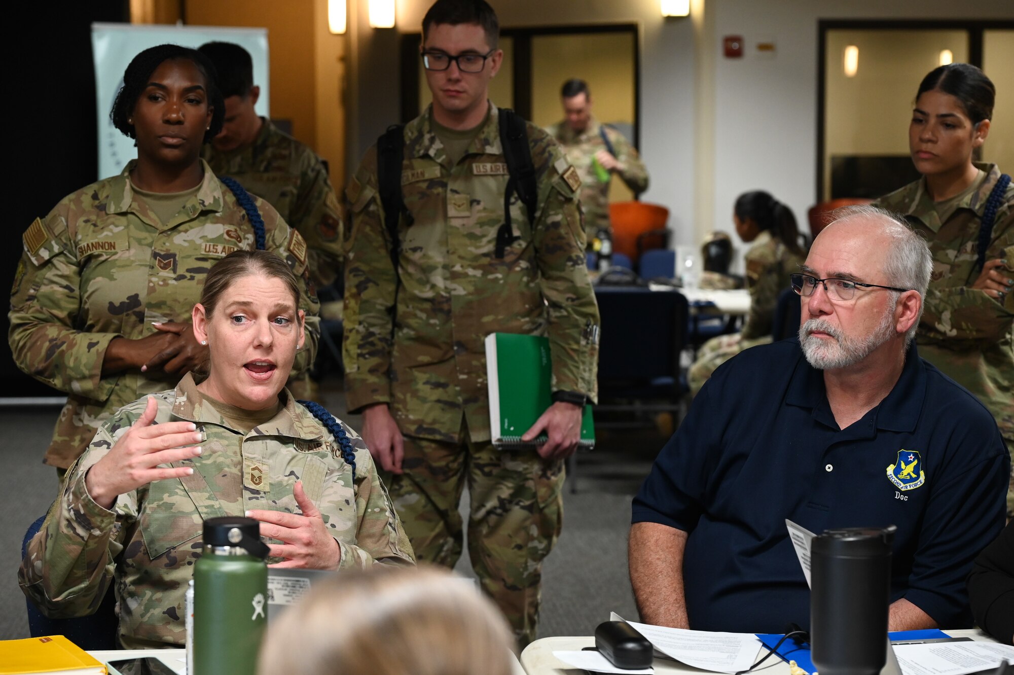 Senior Master Sgt. Michelle LeMond giving speaks to Dr. Brian Davis during Airmanship 200
