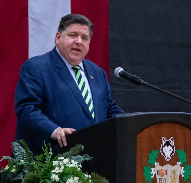 Gov. JB Pritzker thanks the families of the approximately 160 Soldiers from 725th Transportation Company deploying to the U.S. European Command area of responsibility for their support during the unit’s mobilization ceremony Oct. 24 at Harlem High School in Machesney Park.