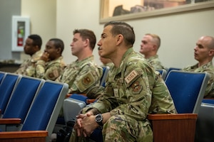 First sergeants from Kirtland Air Force Base listen intently at the First Sergeants Symposium on Kirtland Air Force Base, N.M. on Oct. 28. During the symposium leadership reflected on the importance of the First Sergeant role and the role they play in protecting the well-being of airmen. (U.S. Air Force photo by Airman 1st Class Donnell Schroeter)