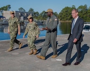 (center right) Commander Michael Mosi, Naval Support Activity Panama City commanding officer, talks with Chief of Naval Operations Adm. Lisa Franchetti as Capt. David Back, Naval Surface Warfare Center Panama City Division (NSWC PCD) commanding officer, and Dr. Peter Adair, NSWC PCD technical director, lead their portion of the admiral’s tour, Oct. 24. The visit allowed Franchetti to see how NSWC PCD, one of the Navy’s premiere research, development, test and evaluation laboratories, supports the fleet through capabilities including mine warfare, expeditionary warfare, robotics, autonomous systems, and naval special warfare. (U.S. Navy photo by Eddie Green)