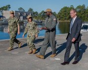 (center right) Commander Michael Mosi, Naval Support Activity Panama City commanding officer, talks with Chief of Naval Operations Adm. Lisa Franchetti as Capt. David Back, Naval Surface Warfare Center Panama City Division (NSWC PCD) commanding officer, and Dr. Peter Adair, NSWC PCD technical director, lead their portion of the admiral’s tour, Oct. 24. The visit allowed Franchetti to see how NSWC PCD, one of the Navy’s premiere research, development, test and evaluation laboratories, supports the fleet through capabilities including mine warfare, expeditionary warfare, robotics, autonomous systems, and naval special warfare. (U.S. Navy photo by Eddie Green)