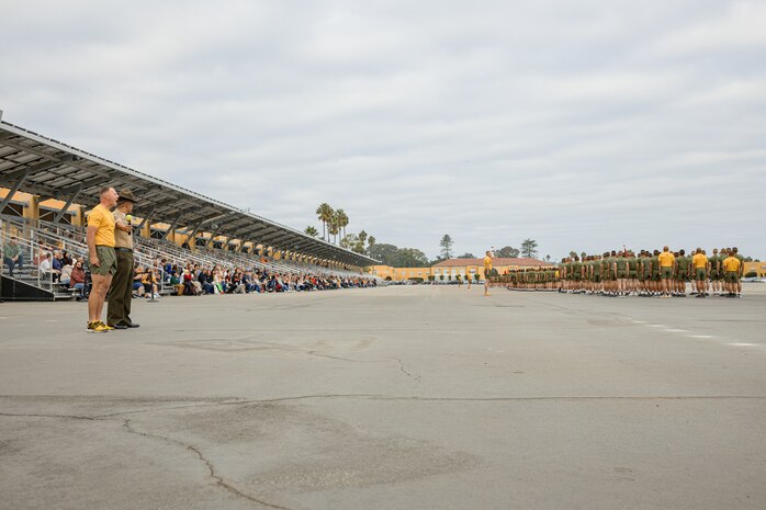U.S. Marines with Echo Company, 2nd Recruit Training Battalion, stand in formation before their motivational run at Marine Corps Recruit Depot San Diego, California, Oct. 17, 2024. The company motivational run is a three-mile cadence run conducted around the Depot and is the last physical training event the Marines will conduct before the graduate from MCRD San Diego. The event is also the first time friends and families will see their newly transformed Marines. (U.S. Marine Corps photo by Cpl. Sarah M. Grawcock)