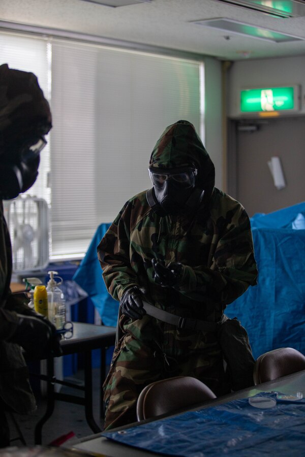 U.S. Marine Corps Lance Cpl. Daymond Velasquez Andrade, a chemical, biological, radiological, and nuclear defense (CBRN) specialist assigned to Marine Wing Support Squadron 171, Marine Aircraft Group 12, and a New York native, prepares to sample an unknown substance during an internal training on Marine Corps Air Station Iwakuni, Japan, Sept. 6, 2024. As CBRN Defense Specialists, Marines are trained to respond to and clear areas with possible CBRN hazards in addition to training units in general CBRN information, identification, and response. (U.S. Marine Corps photo by Sgt. Phuchung Nguyen)