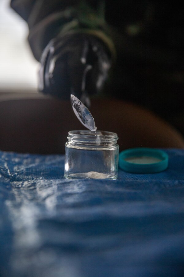 U.S. Marine Corps Lance Cpl. Daymond Velasquez Andrade, a chemical, biological, radiological, and nuclear defense (CBRN) specialist assigned to Marine Wing Support Squadron 171, Marine Aircraft Group 12, and a New York native, collects a sample of an unknown substance during an internal training on Marine Corps Air Station Iwakuni, Japan, Sept. 6, 2024. As CBRN Defense Specialists, Marines are trained to respond to and clear areas with possible CBRN hazards in addition to training units in general CBRN information, identification, and response. (U.S. Marine Corps photo by Sgt. Phuchung Nguyen)
