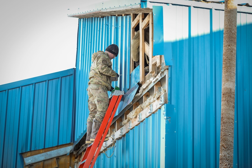 Alaska Organized Militia members assigned to Joint Task Force - Kotzebue assist the Arctic Circle community with recovery efforts, Oct. 26, 2024, following a recent storm that caused severe flooding along Alaska’s West Coast. The 11-member team, including personnel from the Alaska Air and Army National Guard and the Alaska State Defense Force, was activated by the State Emergency Operations Center to support response and recovery efforts.