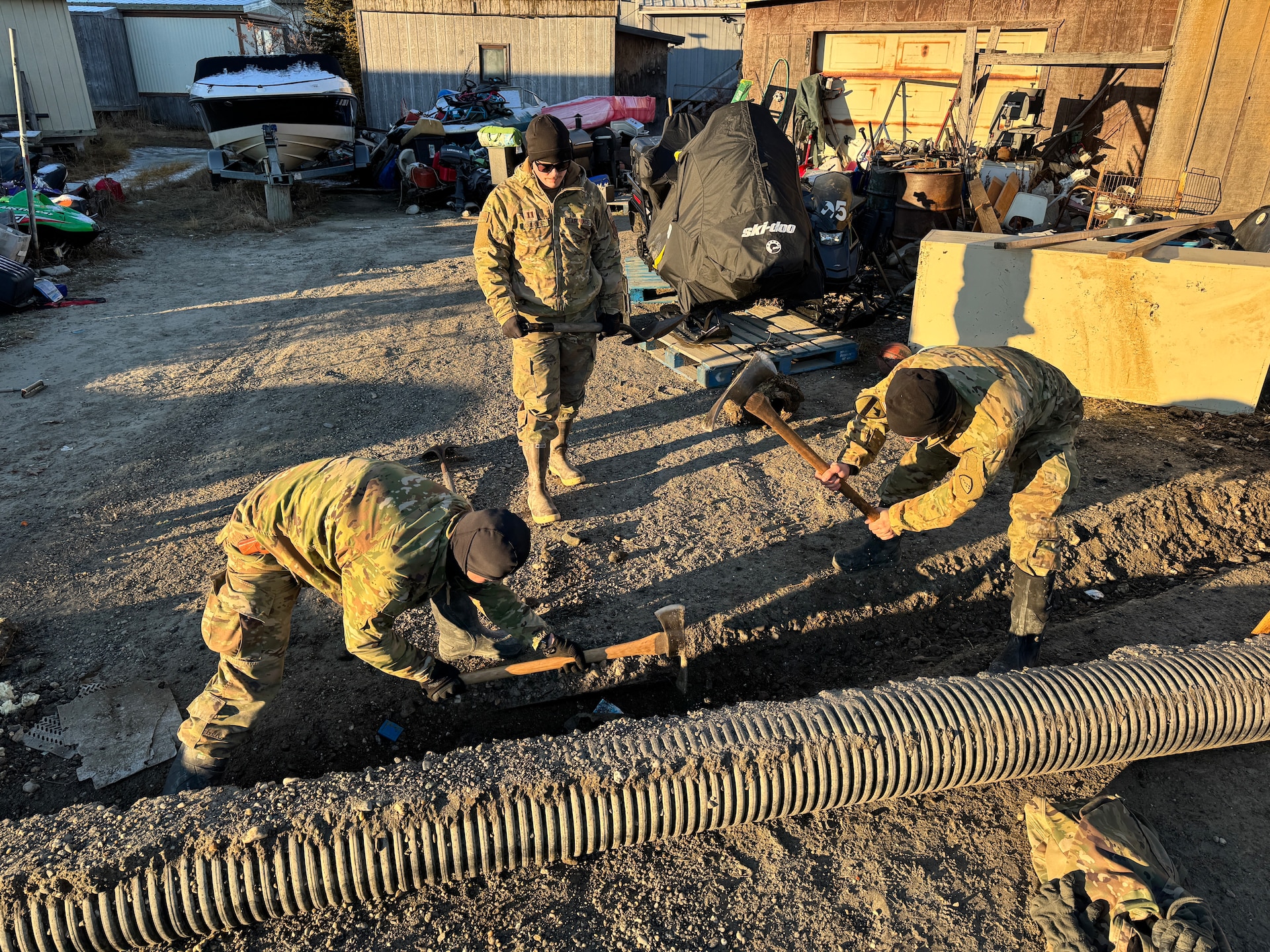 Alaska Organized Militia members assigned to Joint Task Force - Kotzebue assist the Arctic Circle community with recovery efforts, Oct. 26, 2024, following a recent storm that caused severe flooding along Alaska’s West Coast. The 11-member team, including personnel from the Alaska Air and Army National Guard and the Alaska State Defense Force, was activated by the State Emergency Operations Center to support response and recovery efforts.