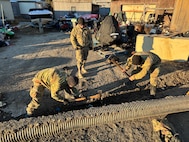 Alaska Organized Militia members assigned to Joint Task Force - Kotzebue assist the Arctic Circle community with recovery efforts, Oct. 26, 2024, following a recent storm that caused severe flooding along Alaska’s West Coast. The 11-member team, including personnel from the Alaska Air and Army National Guard and the Alaska State Defense Force, was activated by the State Emergency Operations Center to support response and recovery efforts.