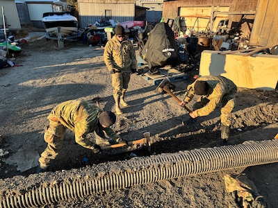 Alaska Organized Militia members assigned to Joint Task Force - Kotzebue assist the Arctic Circle community with recovery efforts, Oct. 26, 2024, following a recent storm that caused severe flooding along Alaska’s West Coast. The 11-member team, including personnel from the Alaska Air and Army National Guard and the Alaska State Defense Force, was activated by the State Emergency Operations Center to support response and recovery efforts.