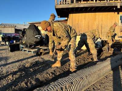 Alaska Organized Militia members assigned to Joint Task Force - Kotzebue assist the Arctic Circle community with recovery efforts, Oct. 26, 2024, following a recent storm that caused severe flooding along Alaska’s West Coast. The 11-member team, including personnel from the Alaska Air and Army National Guard and the Alaska State Defense Force, was activated by the State Emergency Operations Center to support response and recovery efforts.